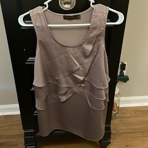 Limited sleeveless blouse